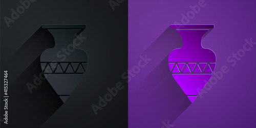 Paper cut Ancient amphorae icon isolated on black on purple background. Paper art style. Vector.