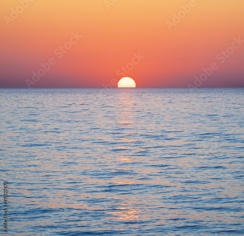 Calm sea sunset. © GIS