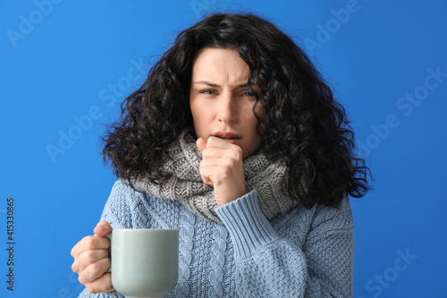 Sick young woman with hot t...