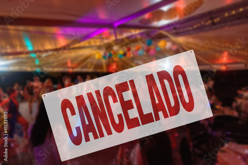 Spanish inscription CANCELED. Cancelled public events. Coronavirus, lockdown and restrictions concept
