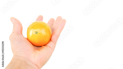 Orange on hand, on white background