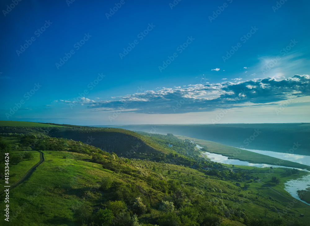 Beautiful view over the river on a sunrise. Outdoor recreation. Dniester panorama.