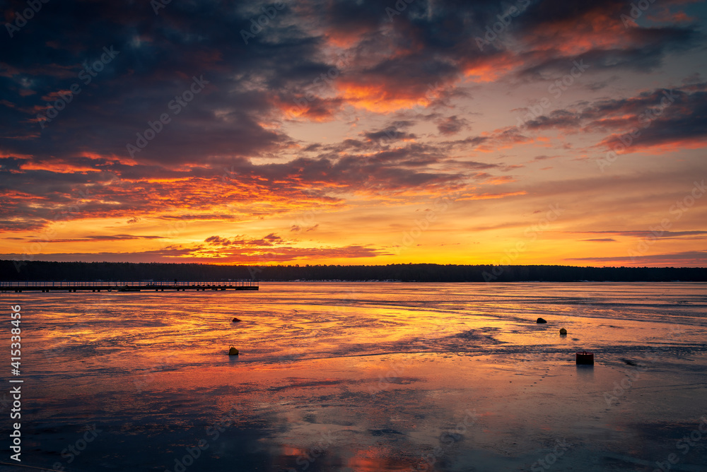 Beautiful sunset on the frozen winter lake, zalew zemborzycki lublin poland