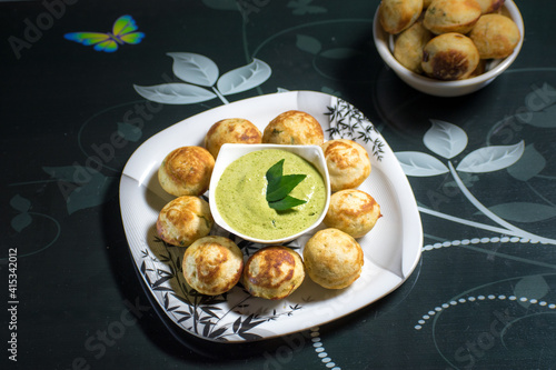 Indian Home Made Recipe 'Aappe' with Green Chatni. Specialty Of South Indian Food
