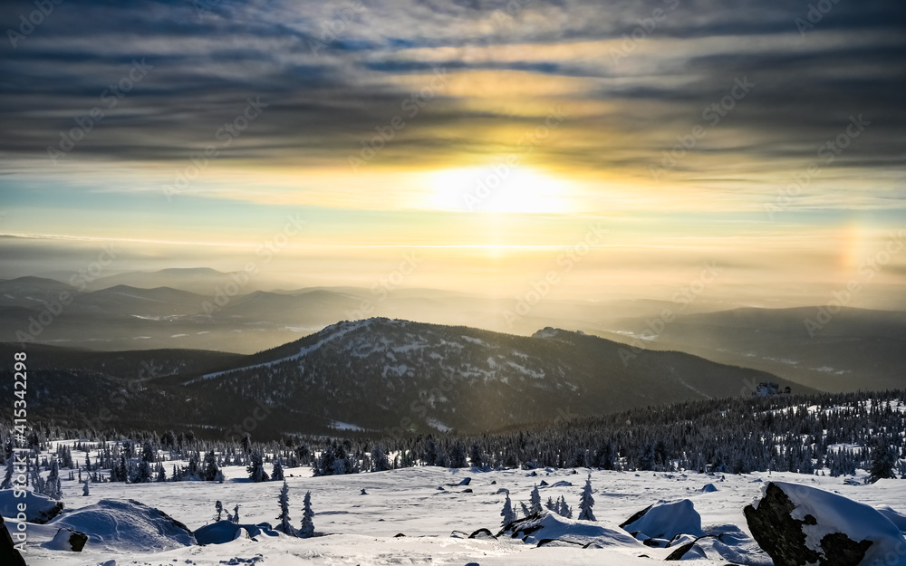 sunset in the mountains in winter
