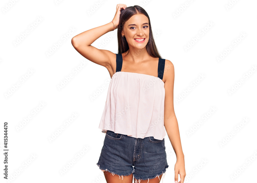 Obraz premium Young hispanic woman wearing casual clothes confuse and wonder about question. uncertain with doubt, thinking with hand on head. pensive concept.