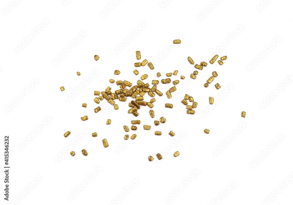 Golden sprinkles isolated on white background top view. Sweet golden glaze decoration or chocolate vermicelli