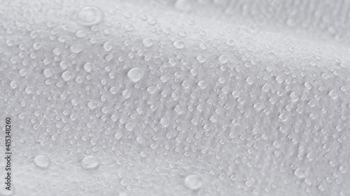 Photos water droplets on a white cloth surface