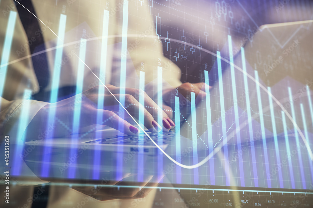 Double exposure of businesswoman hands typing on computer and financial graph hologram drawing. Stock market analysis concept. Double exposure of businesswoman hands typing on computer and financial graph hologram drawing. Stock market analysis concept.