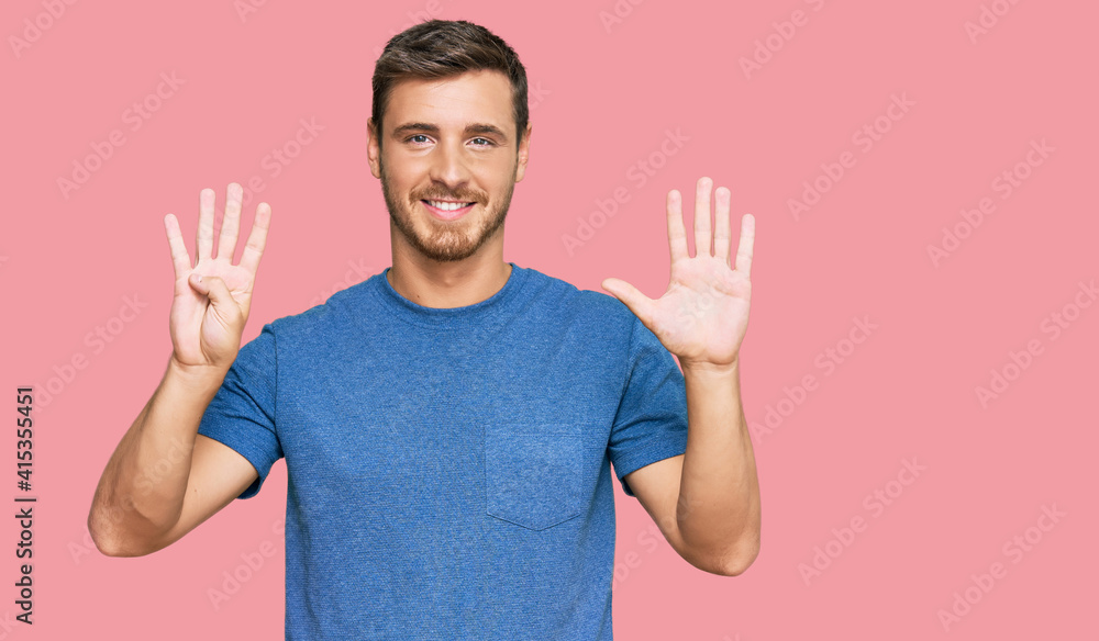 Handsome caucasian man wearing casual clothes showing and pointing up with fingers number nine while smiling confident and happy. Handsome caucasian man wearing casual clothes showing and pointing up with fingers number nine while smiling confident and happy.