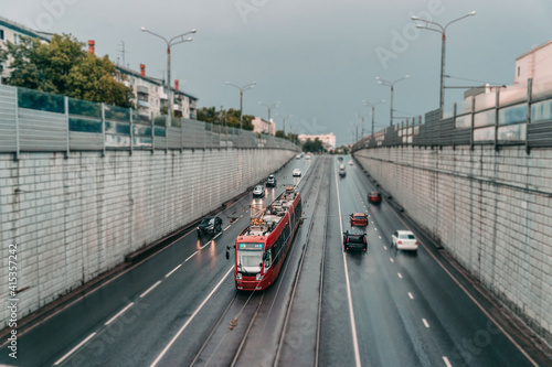 Red modern tram on the street in Kazan, Russia. Kazan's tram networks consists of 5 lines. 