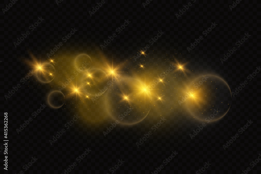 Fototapeta premium The dust sparks and golden stars shine with special light. Vector sparkles on a transparent background. Christmas light effect. Sparkling magical dust particles. 