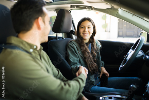 Caucasian adolescent girl arriving for her driver's license exam © AntonioDiaz