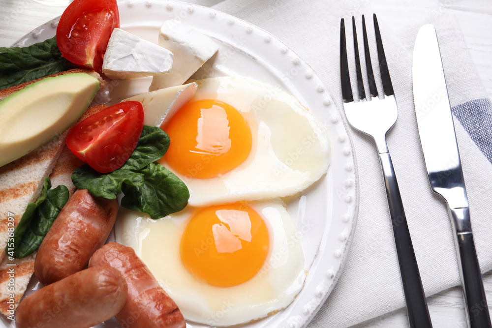Delicious breakfast with fried eggs served on table, closeup Delicious breakfast with fried eggs served on table, closeup