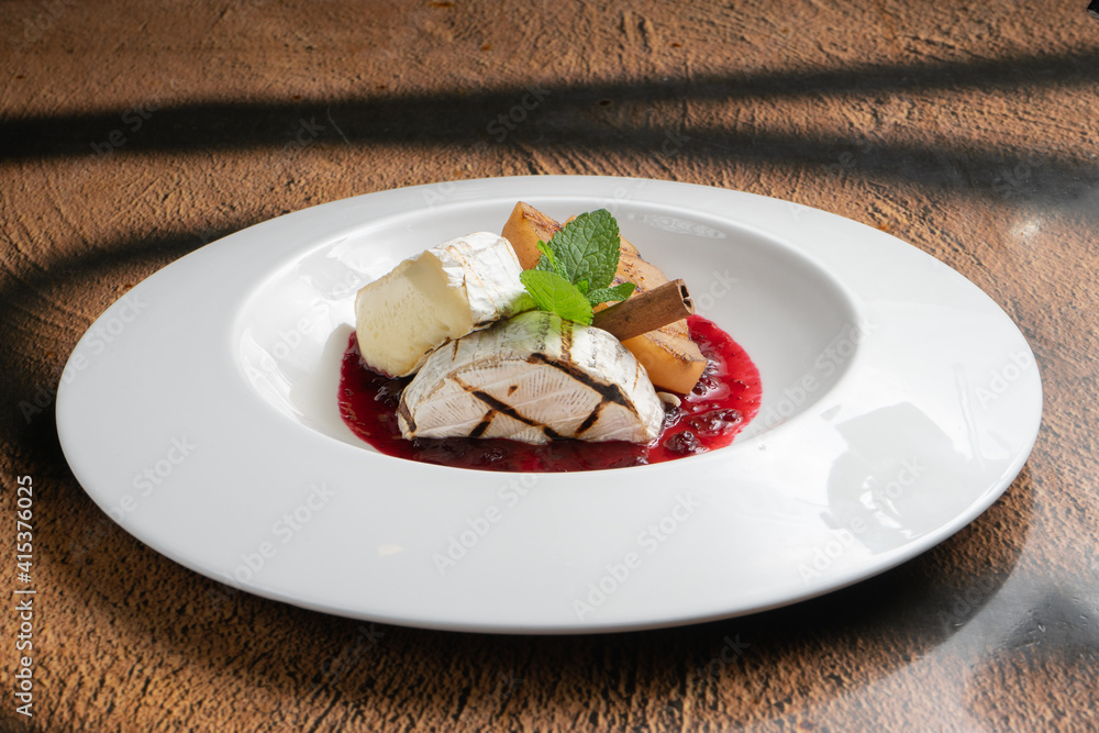Grilled camembert cheese with cranberry jam and pear Grilled camembert cheese with cranberry jam and pear
