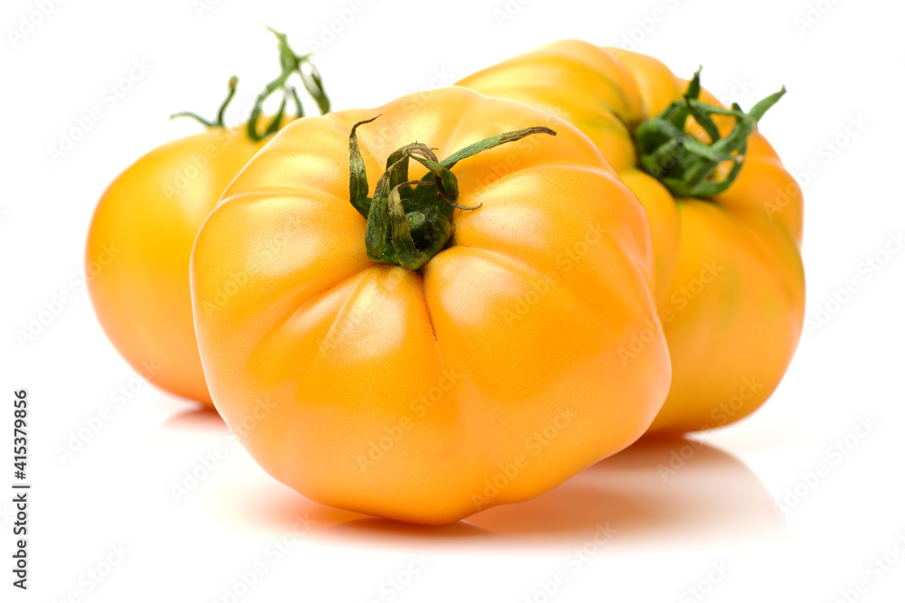 fresh yellow tomatoes on white background fresh yellow tomatoes on white background