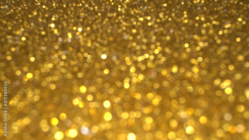 Gold bokeh holiday background. Magic shiny texture, glitter and lights Gold bokeh holiday background. Magic shiny texture, glitter and lights