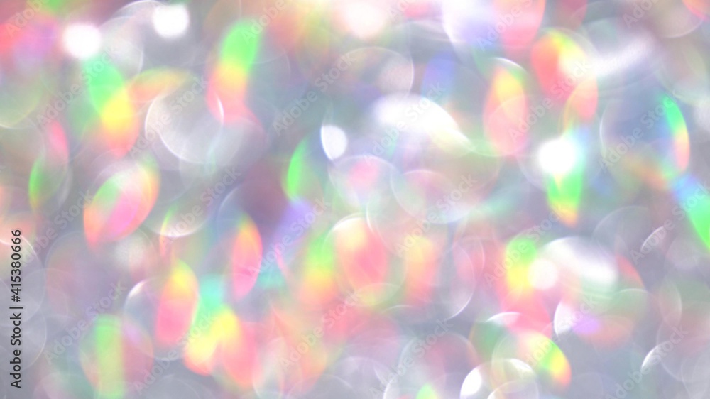 Holographic glitter. Magic circles lights abstract background. Blurred colorful light dots