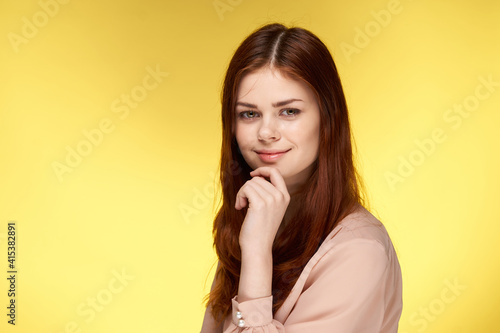 beautiful woman attractive look cropped view yellow isolated background