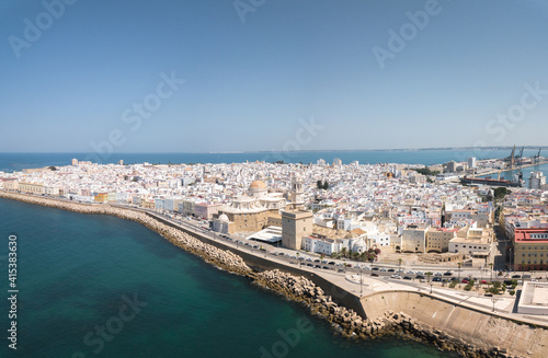 Drone panoramic view of Cadiz City. View of the south part of the city. In background the commercial harbour. Costa de Luz  - Spain