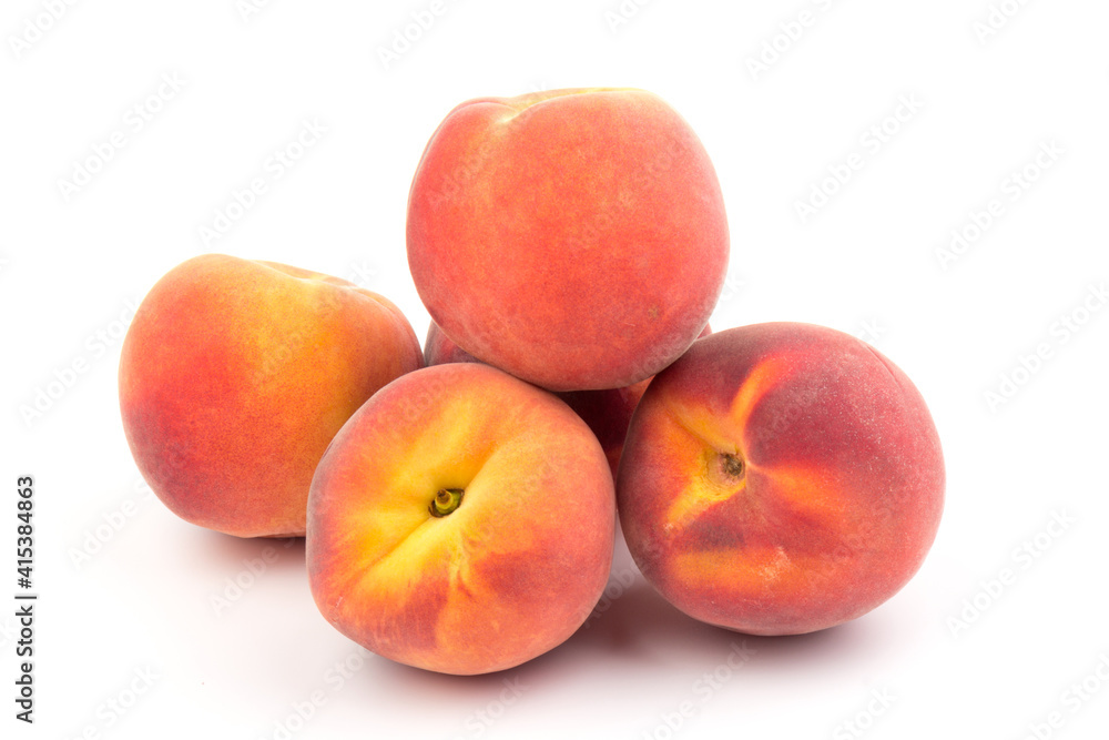 Summer fruit background. Ripe juicy peaches on white background. Copy space. Fresh organic fruit vegan food. Harvest concept Summer fruit background. Ripe juicy peaches on white background. Copy space. Fresh organic fruit vegan food. Harvest concept