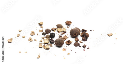 Allspice, pimento spice crushed,  Jamaican pepper and shavings isolated on white background