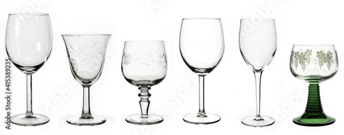 Set of six wine glasses isolated on white background