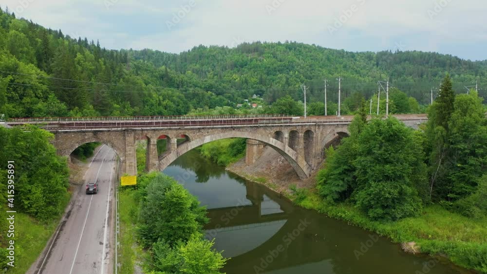 Nikolsky stone bridge over the Sim river in the Chelyabinsk region of Russia. The author of the project Belelyubsky. Aerial Video Nikolsky stone bridge over the Sim river in the Chelyabinsk region of Russia. The author of the project Belelyubsky. Aerial Video