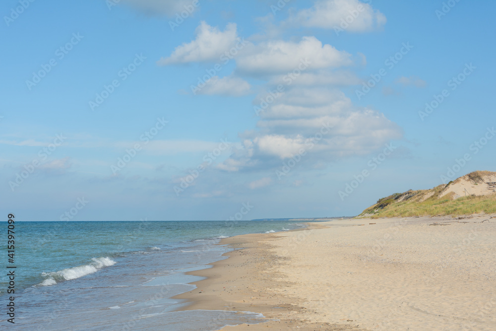 Seaside and white sandy beach in summer. Vacation and travel concept