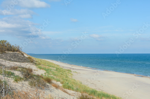 Fototapeta Naklejka Na Ścianę i Meble -  White sand beach on Baltic Sea coast. National Park Curonian Spit