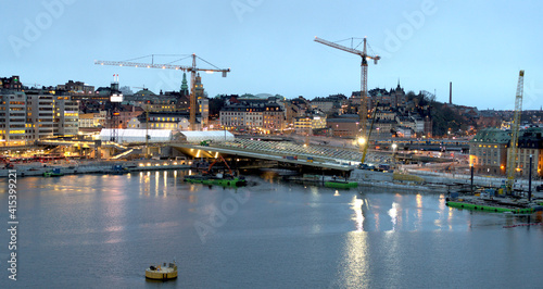 Construction of a new bridge in Slussen in central Stockholm during nightfall, Sweden photo