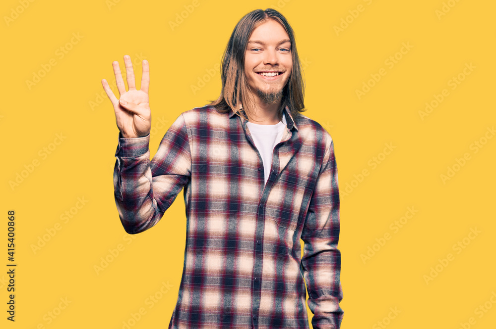Handsome caucasian man with long hair wearing hipster shirt showing and pointing up with fingers number four while smiling confident and happy. Handsome caucasian man with long hair wearing hipster shirt showing and pointing up with fingers number four while smiling confident and happy.