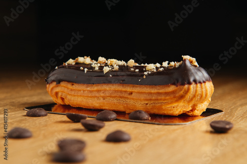 Fotografie Traditional french eclair with chocolate