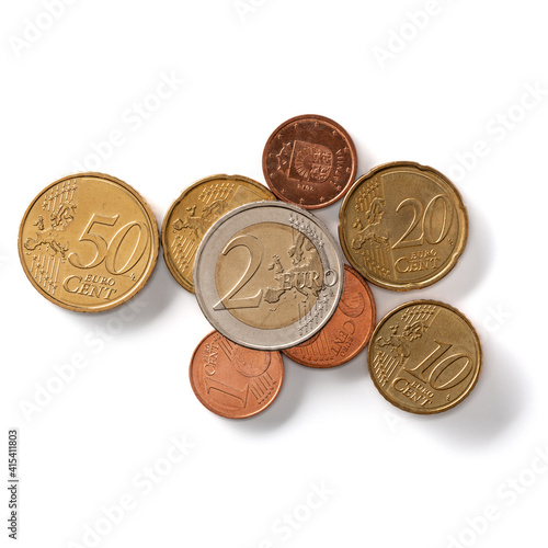 Euro coins isolated over white background closeup. Money concept. Top view, flat lay.