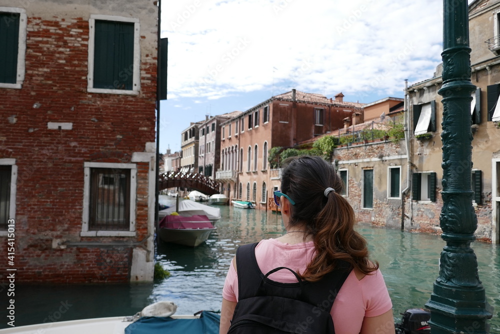 a woman in Venice, Veneto, Italy, September
