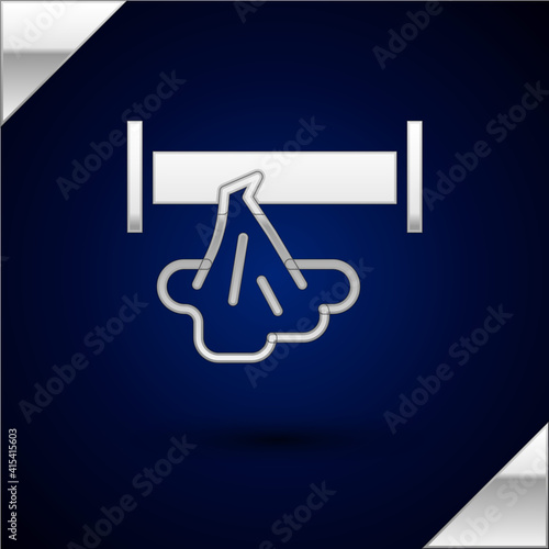 Silver Broken metal pipe with leaking water icon isolated on dark blue background. Vector.