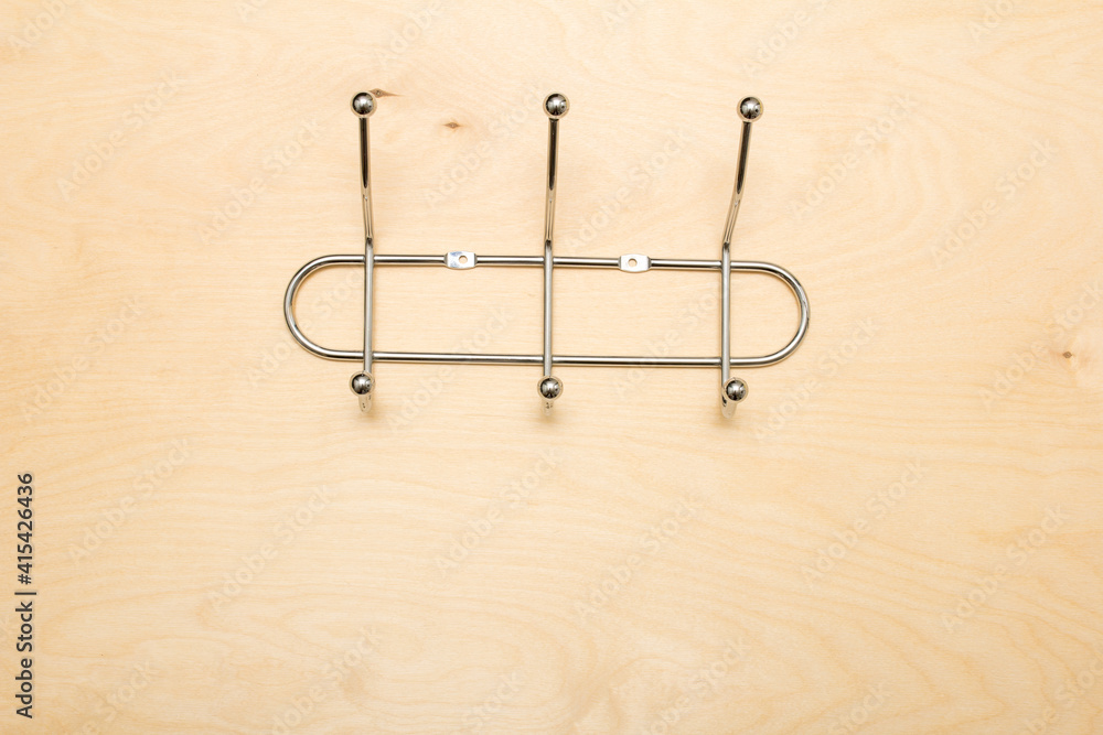 Fototapeta premium wall hanger on wooden background