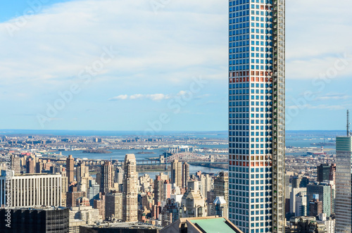 Aerial View of Upper East Side and East River. Historic Towers and a Skyscraper Under Construction. Manhattan, New York City, USA