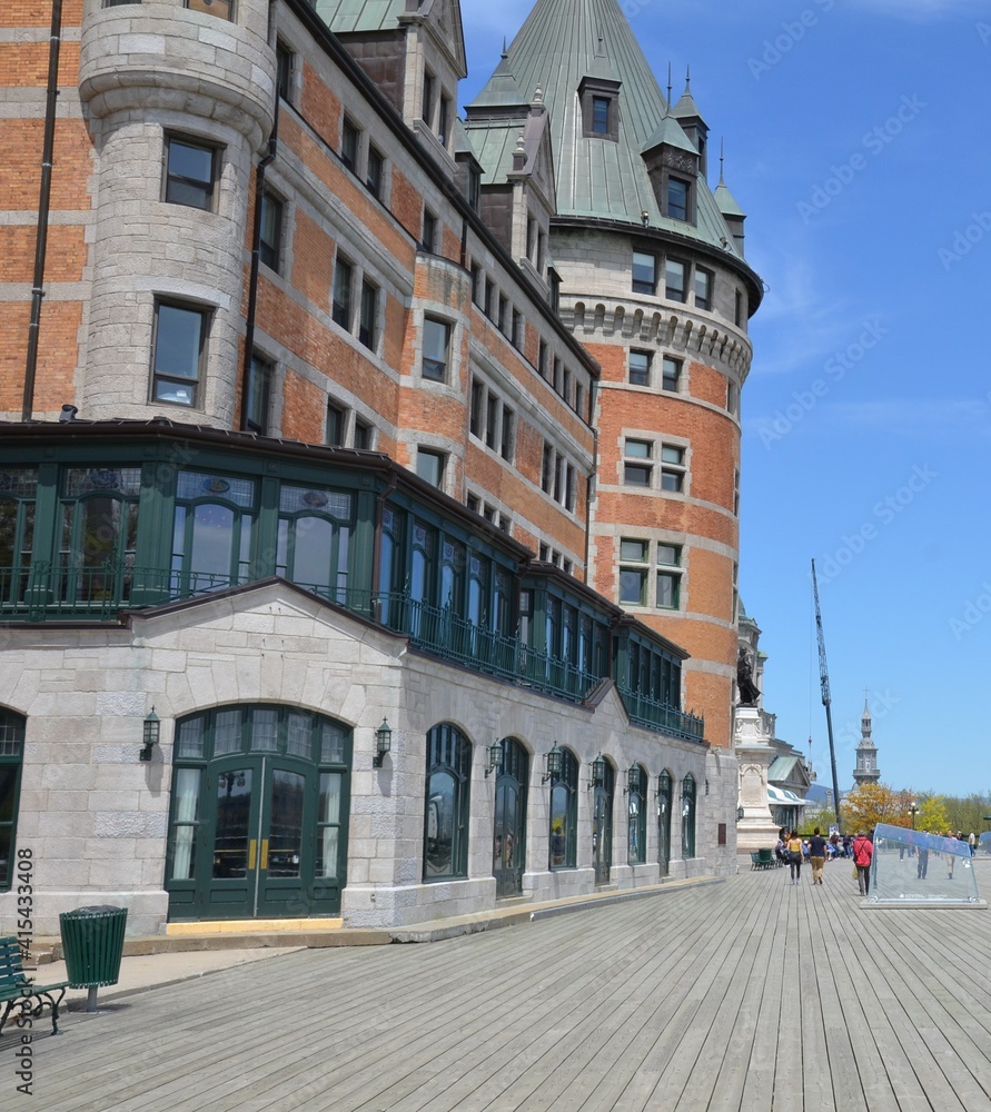 building and glass window on boardwalk in Quebec, Canada