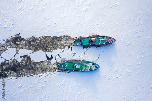 Obraz na plátně Two icebreakers breaking ice on Vistula river, Poland, 2020-02-18