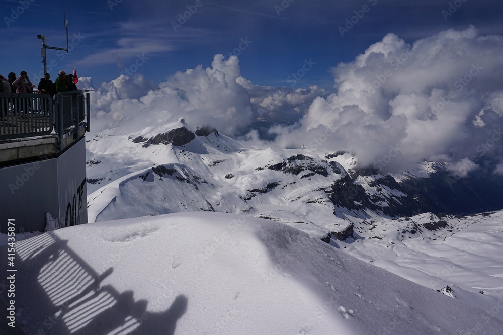 A Panoramic view of snow peaked Alps from Schilthorn, Switzerland