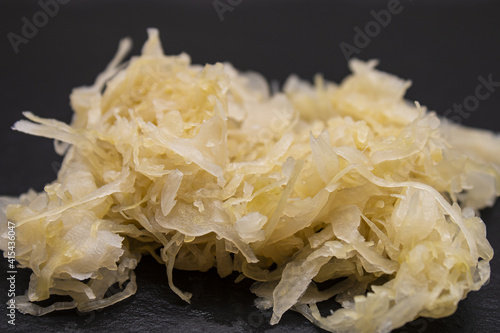 homemade raw sauerkraut on a slate plate