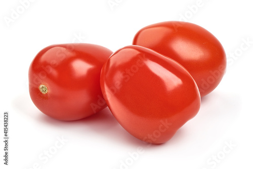 Fresh tomatoes, close-up, isolated on white background