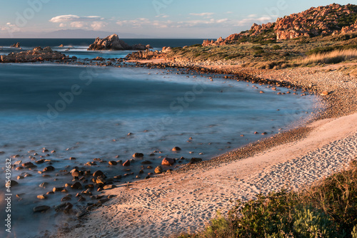 View on Cala Caneddi beach, in Sardinia, during sunset