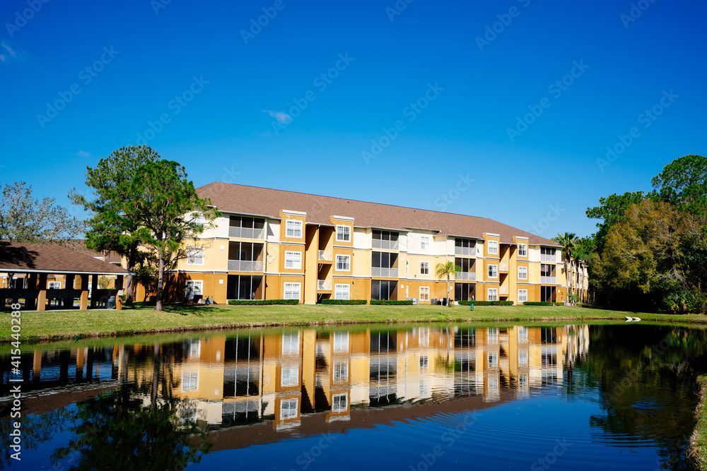  Florida apartment and pond reflection	