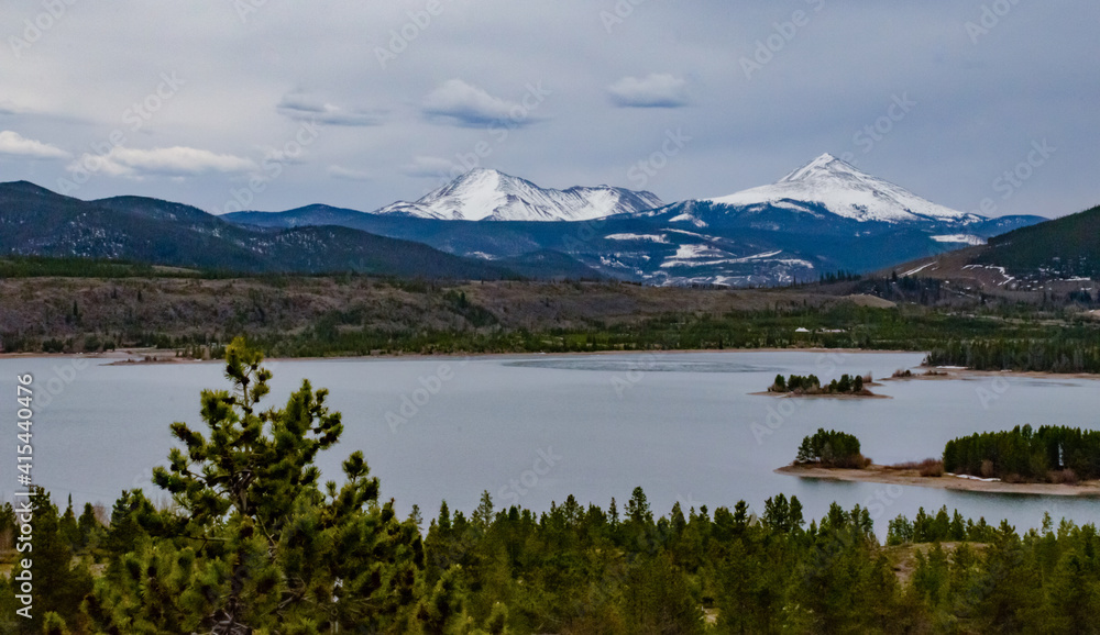 Snow-capped mountains in the background of a mountain lake in Utah, nature US