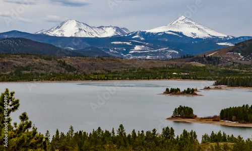 Snow-capped mountains in the background of a mountain lake in Utah  nature US