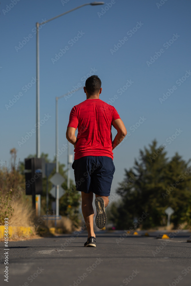 mexican man running outdoors