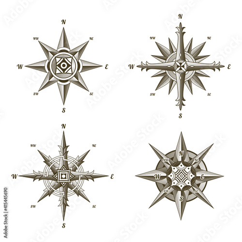 Collection of nautical antique compass signs. Old vector design elements for marine theme and heraldry on white background. Vintage vector wind rose labels emblem