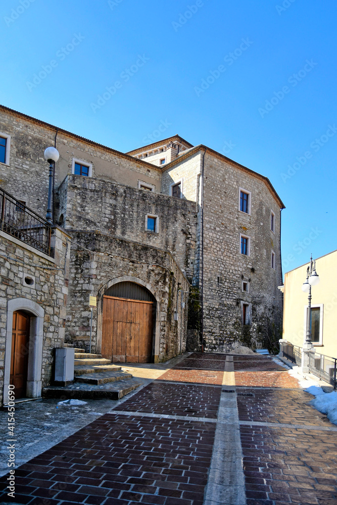 A street among the old stone houses of Castelpagano, a medieval village in the province of Benevento.